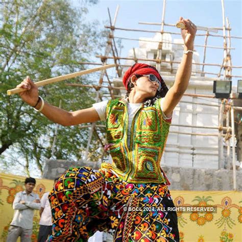 A dancer of Rajasthan perform Gher Dance at Sola in Ahmedabad to mark ...