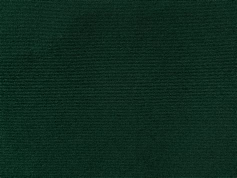 Dark green old velvet fabric texture used as background. Empty green ...