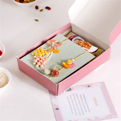 String Of Pearls Rakhi Lumba Hamper Set Of 4 With Gift Box And Card ...