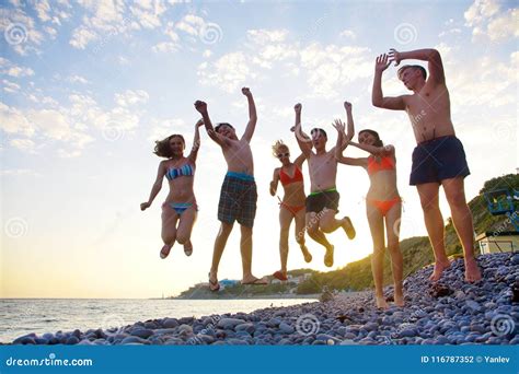 Teens on beach stock photo. Image of funny, recreation - 116787352