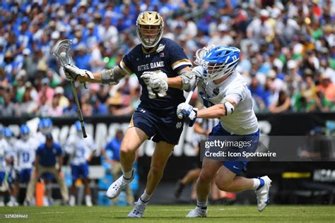 Notre Dame Fighting Irish midfield Reilly Gray runs with the ball ...