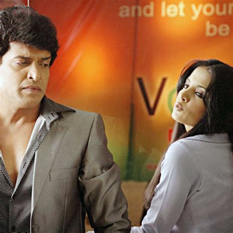 Upendra and Celina Jaitley in a still from the Telugu movie XYZ