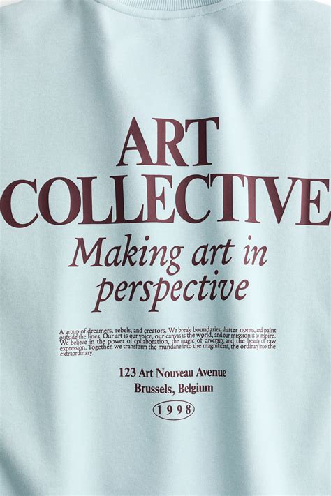 Text-motif sweatshirt - Light turquoise/Art Collective - Ladies | H&M IN