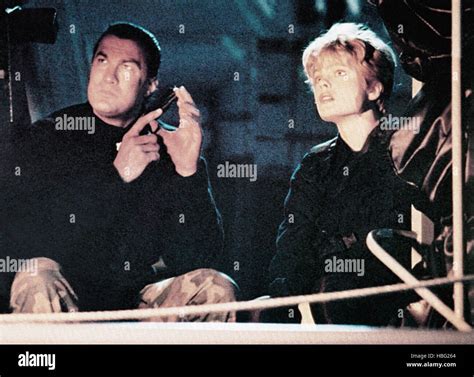 UNDER SIEGE, from left, Steven Seagal, Erika Eleniak, 1992, ©Warner ...