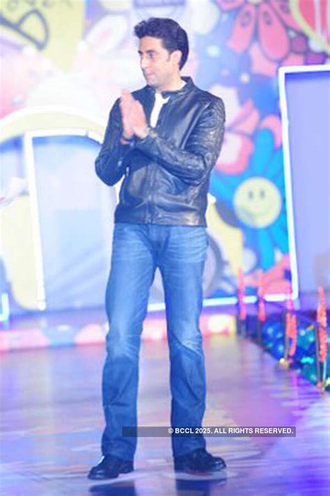 Abhishek Bachchan greets the crowd during Ritu Beri's kids fashion ...