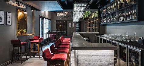 A play of textures creates a European experience in this lounge bar ...