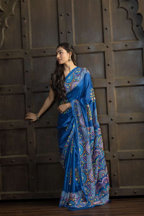 Exclusive Gachi by Gachi Tussar with Lambani mirror handwork in blue b ...