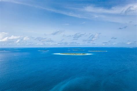 Aerial view of tropical islands in noonu atoll maldives coral reef and ...
