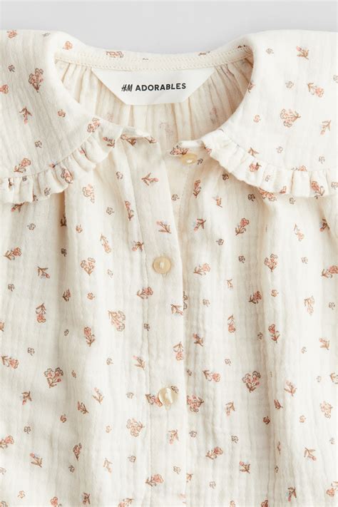 Cream/Floral Cotton muslin romper suit for kids | H&M IN
