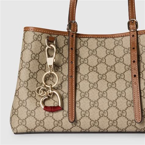 Heart-shaped keychain in Rosso Ancora red enamel | GUCCI® US