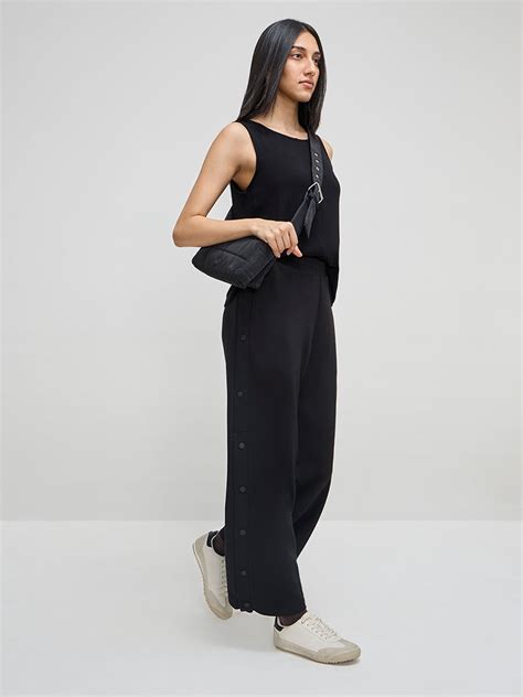 Buy LOV Black Solid High-Rise Trousers from Westside
