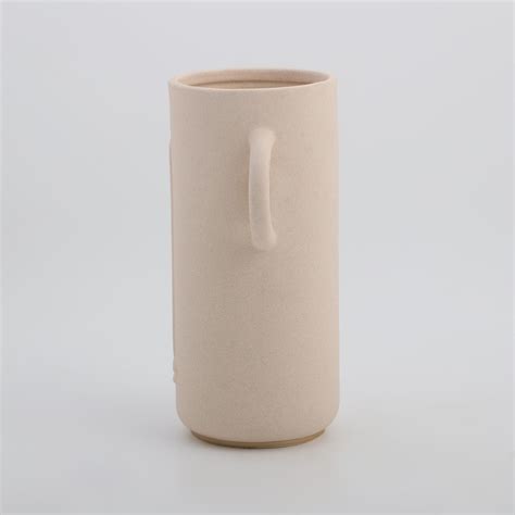 Buy Marshmallow Ceramic Human Face Vase from Home Centre at just INR 1299.0