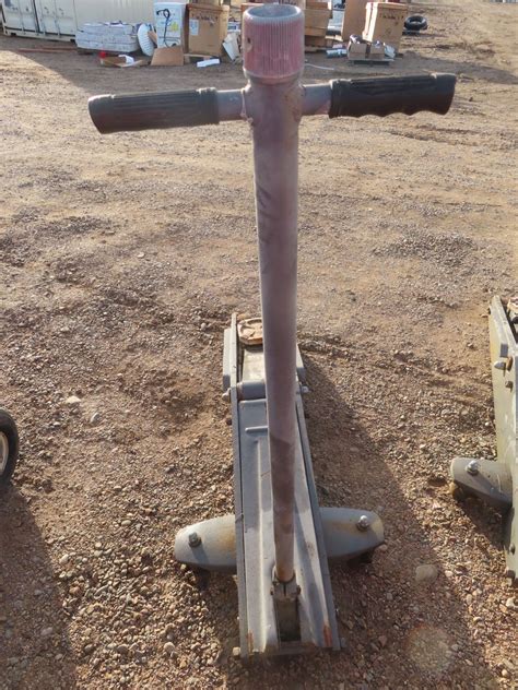 20 ton floor jack in working condition - Schmalz Auctions