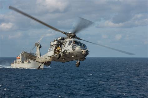 Sleek Sikorsky SH-60 Seahawk Military Helicopter HD Wallpaper Over Ocean