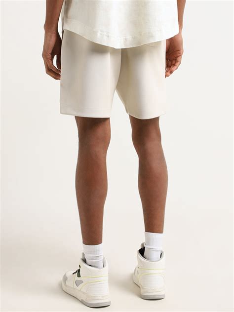Buy Studiofit Beige Relaxed Fit Shorts from Westside