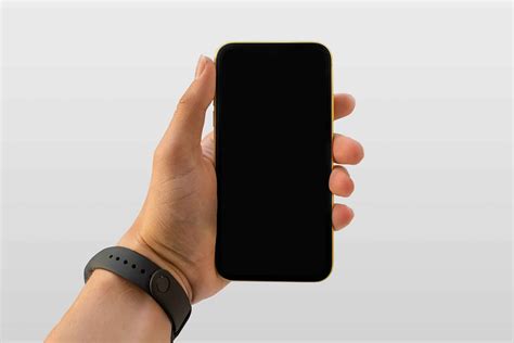 Phone in Hand Mockup (PSD)
