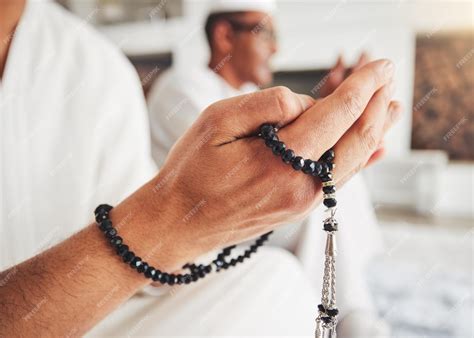 Premium Photo | Prayer beads Muslim person hands and Islamic faith ...
