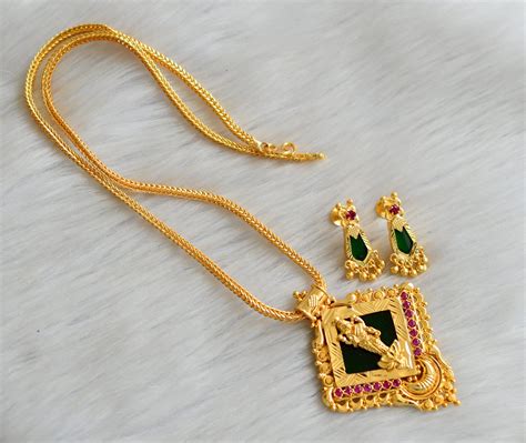 Gold tone pink stone green Lakshmi Kerala style pendant with chain and ...