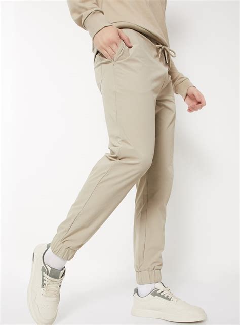 Buy Men Textured Slim Fit Sports Joggers Online at just Rs. 999.0 ...
