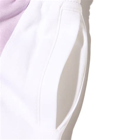 NIKE AS W NSW TEAM NK FLC PNT DOLL/WHITE 22FA-I（ナイキ ウィメンズ NSW TEAM NIKE ...