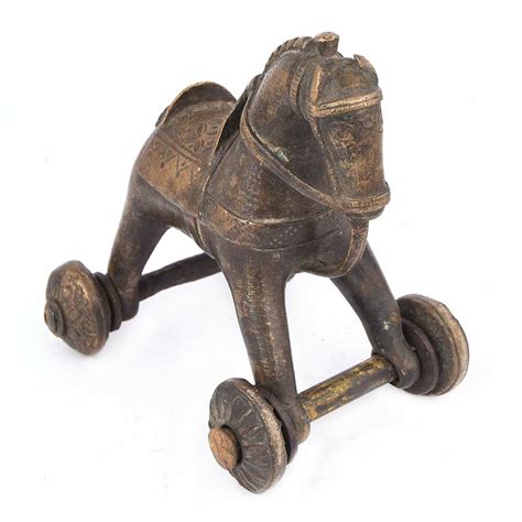 Aged Brass Horse on Wheel