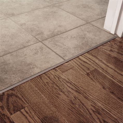 Heated floor with adjacent surface of lower height with a plywood ...