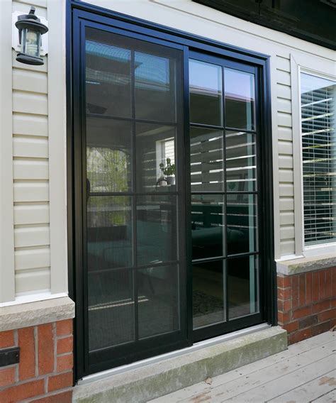 Level up up your backyard with a black double sliding patio door with ...