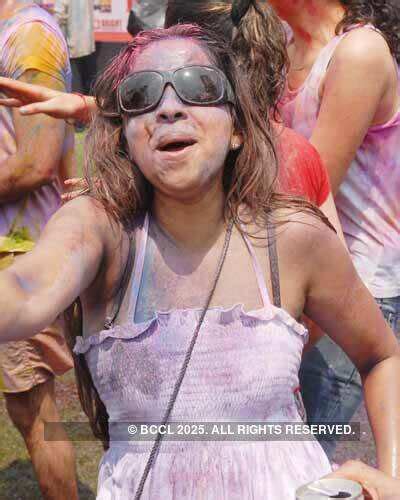 A guest enjoys during the Zoom Holi party 2009 at Dariya Mahal ...
