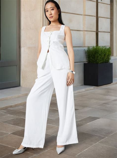 Buy Women Solid Wide Leg Trousers Online at just Rs. 1199.0 ...