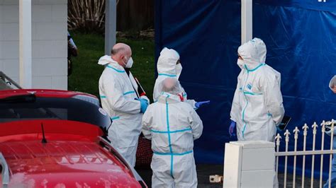 Woman detained in investigation of 2 half-sisters’ bodies buried in suitcases, Cleveland police say