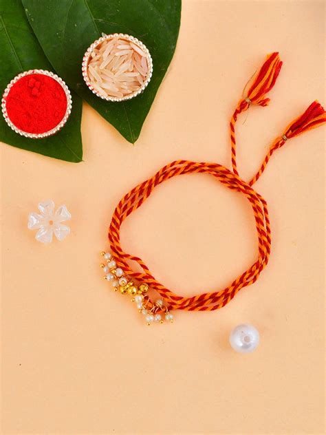 Moli Thread Woven Pearl and Ghungroo Rakhi – Aapno Rajasthan