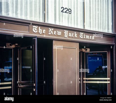 New York 1980s, The New York Times newspaper entrance, revolving doors ...