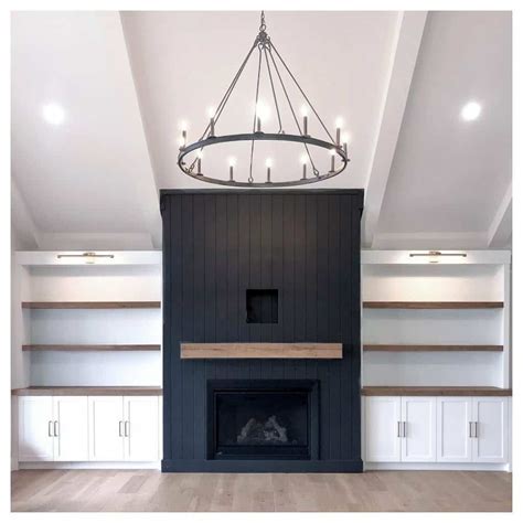 Black Vertical Shiplap Fireplace With Chandelier - Soul & Lane