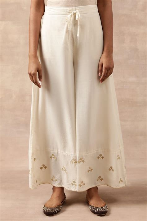 Buy Ecru Solid Flared Pants @ 2799 | W for woman – wforwoman