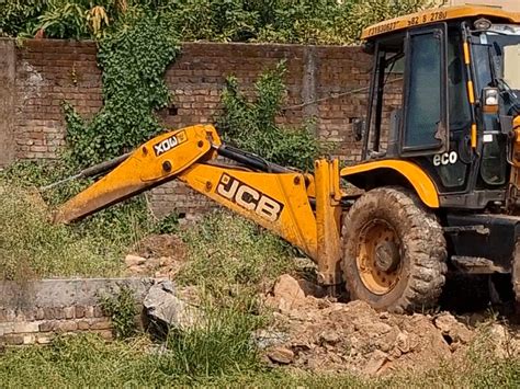 Madrasa construction on govt land demolished in Jabalpur; Woman was ...