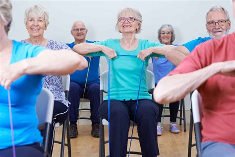 https://www.asburyvillagegodfrey.com/wp-content/uploads/2022/03/seniors-doing-chair-aerobics-scaled.jpeg