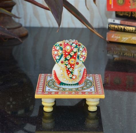 Lord Ganesha on Kundan Studded Marble Chowki - eCraftIndia Online