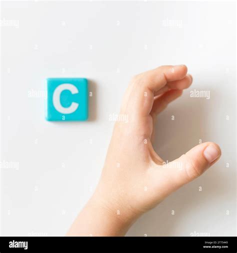 Sign language hand showing letter c Stock Photo - Alamy