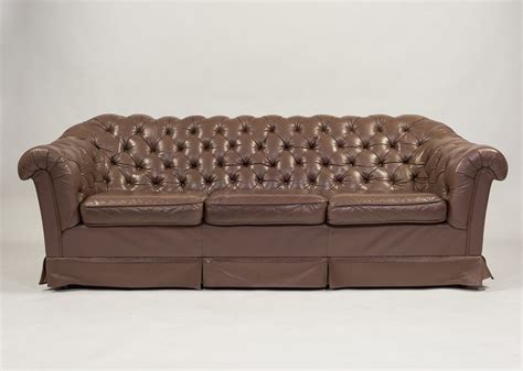Chesterfield style three seater leather sofa | #119359