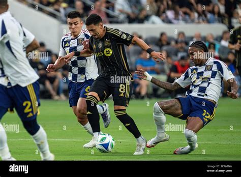 LAFC midfielder Marco Delgado (8) gets past Real Salt Lake forward ...