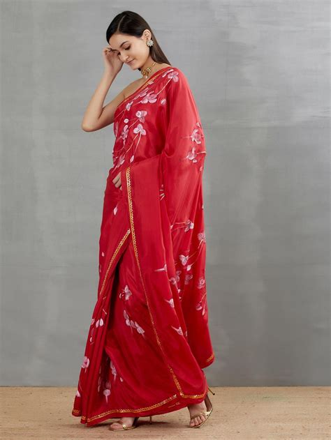 White Fuschia’s On Red Silk Saree with border – Picchika