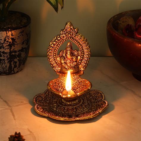 Buy Handmade Virhau Lord Ganpati Metal Oil Lamp / Diya Online On Zwende