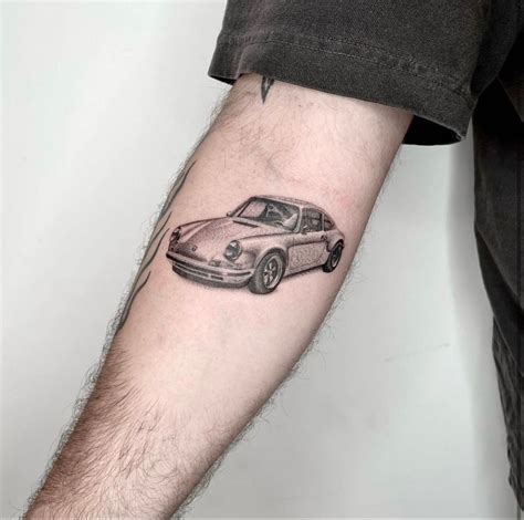 car tat in 2025 | Geometric sleeve tattoo, Black line tattoo, Geometric flower tattoo