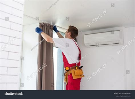 Installing Window Curtain 的图像结果