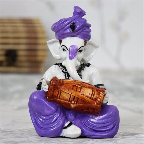 Lord Ganesha playing Dholak - eCraftIndia Online