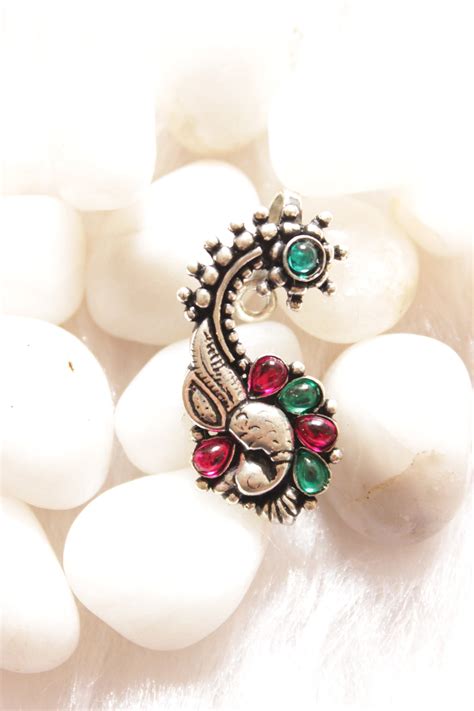 Traditional Stones Embedded Silver Finish Peacock Shape Clip-On Mahara ...