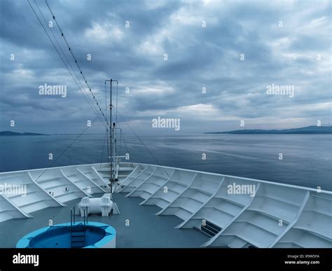 bow of ship navigating with dramatic weather Stock Photo - Alamy