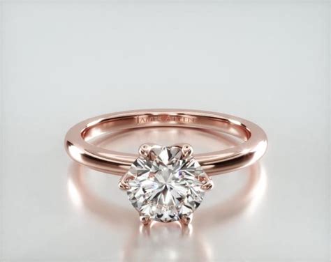 Solitaire Engagement Ring Embellished With a Scalloped Six Prong Head ...
