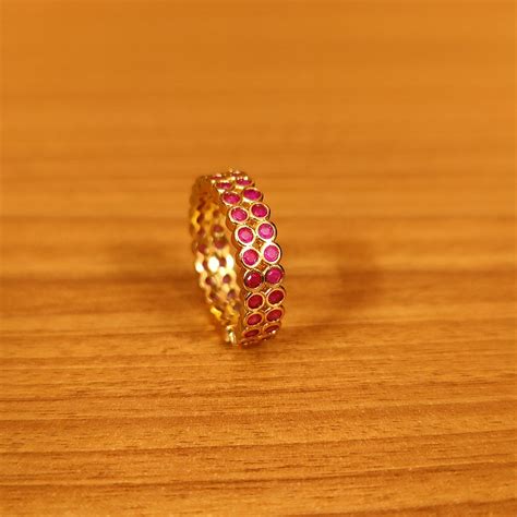 RUBY COLOUR CZ STUDDED GOLD PLATED ADJUSTABLE RING – Sanvi Jewels