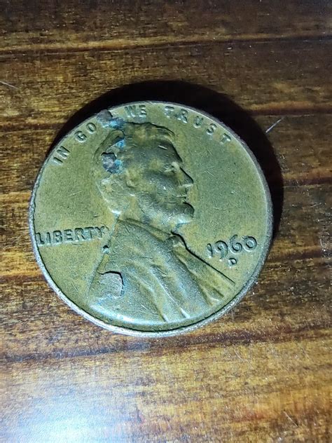 I recently found this 1960 Penny with a Denver Mint mark and it looks ...